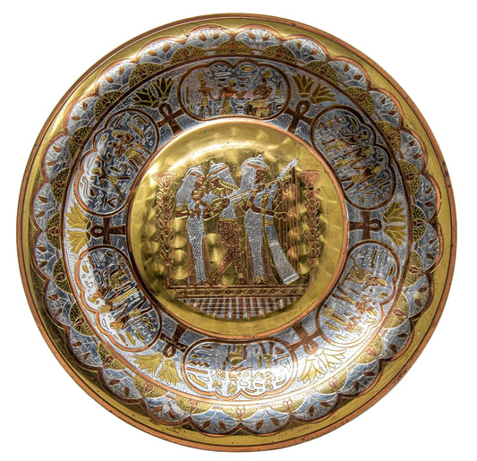 An ornate round decorative plate with a gold center and a wide border featuring intricate silver and gold relief illustrations and Hebrew text, shown on a plain white background.