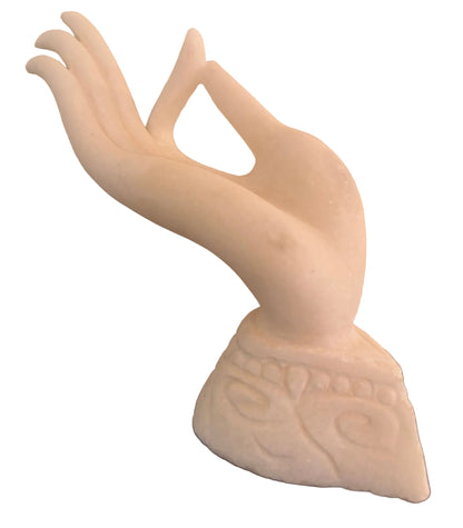 White marble sculpture of a hand