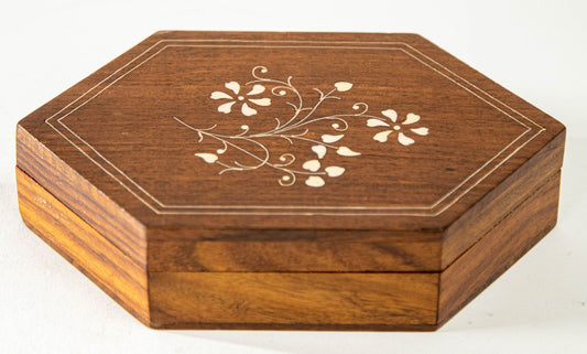 Vintage Moroccan inlaid hexagonal wood box with floral patterns on the lid.