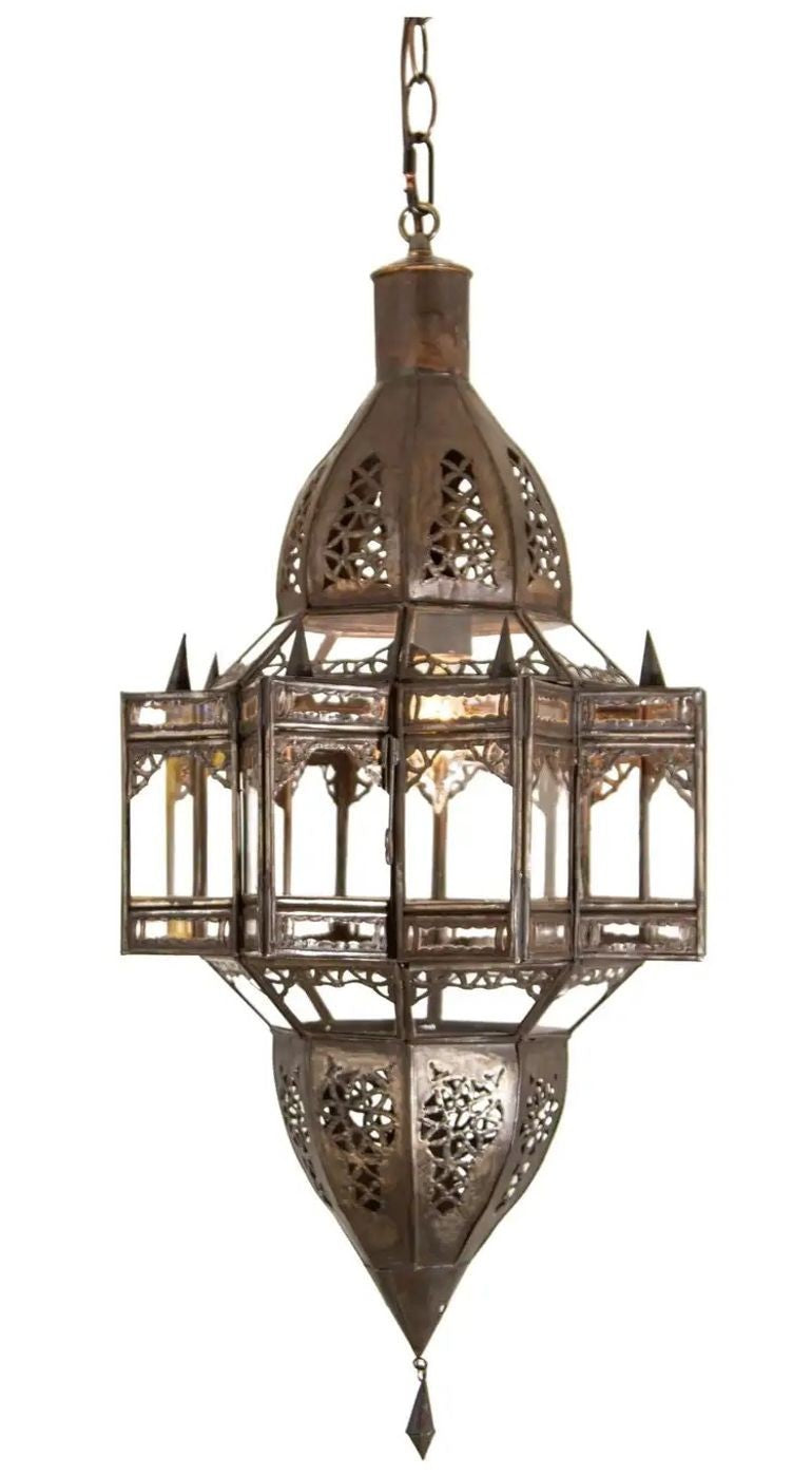 A vintage Moroccan Moorish star shape clear glass and metal lantern with intricate geometric patterns, dark bronze patina metal finish, ready to install with chains and a ceiling canopy.