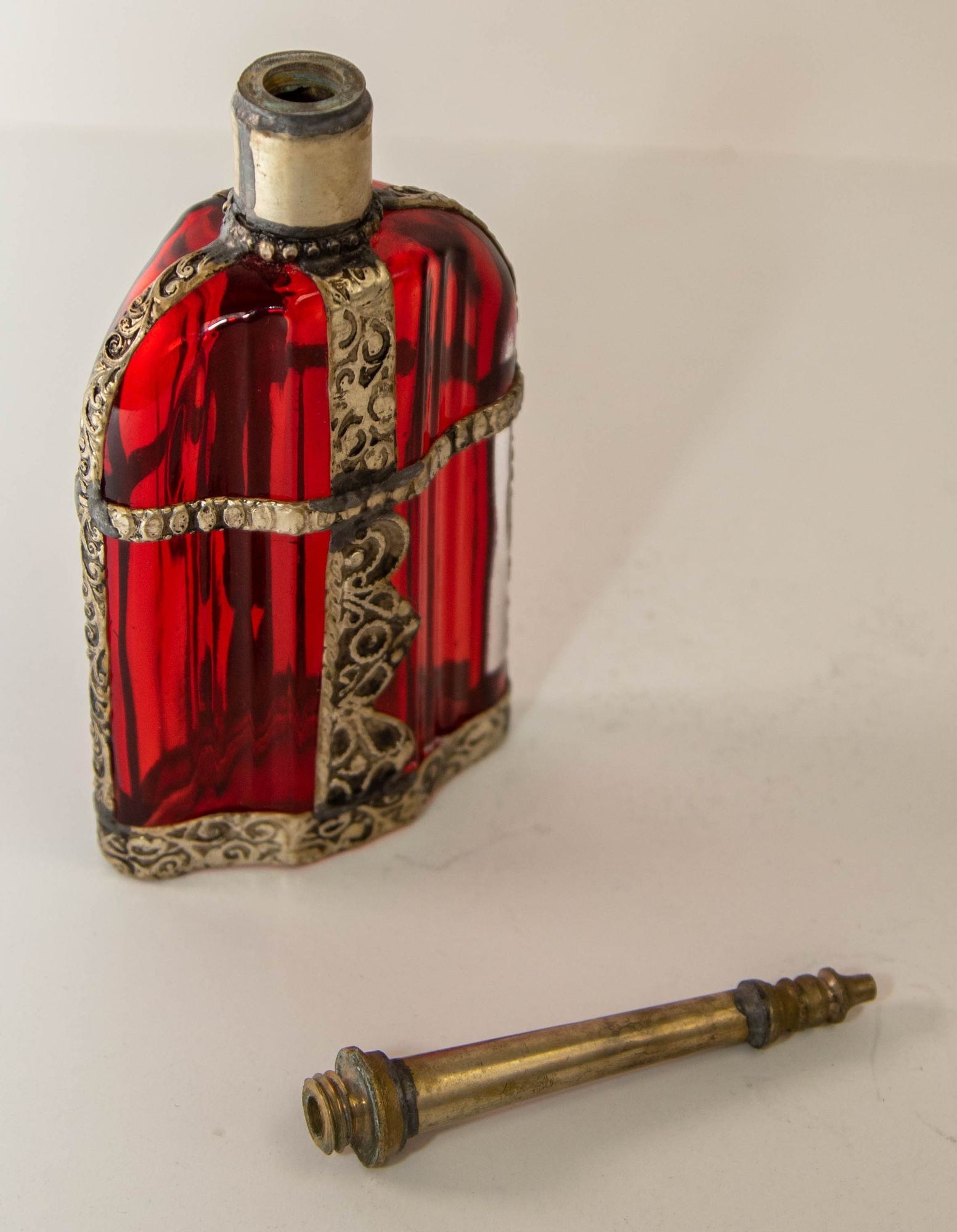 Moroccan Perfume Bottle Sprinkler with Embossed Metal Overlay and Red Glass