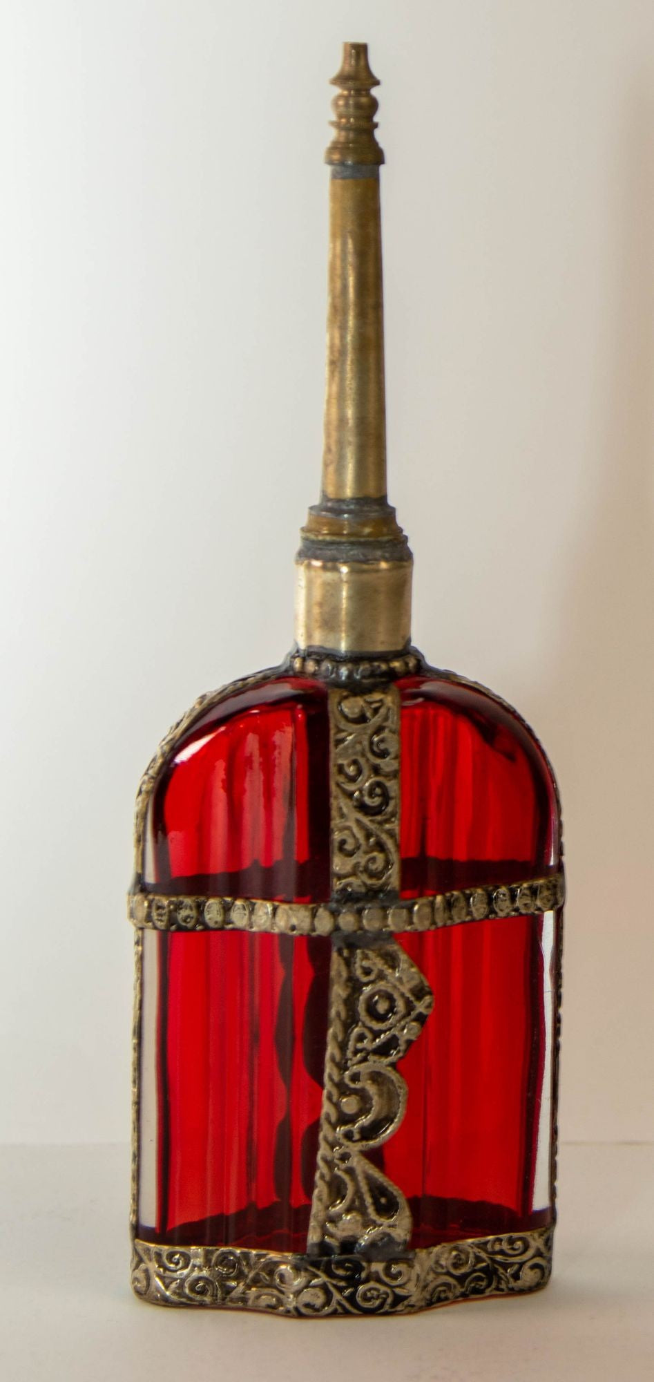 Moroccan Perfume Bottle Sprinkler with Embossed Metal Overlay and Red Glass