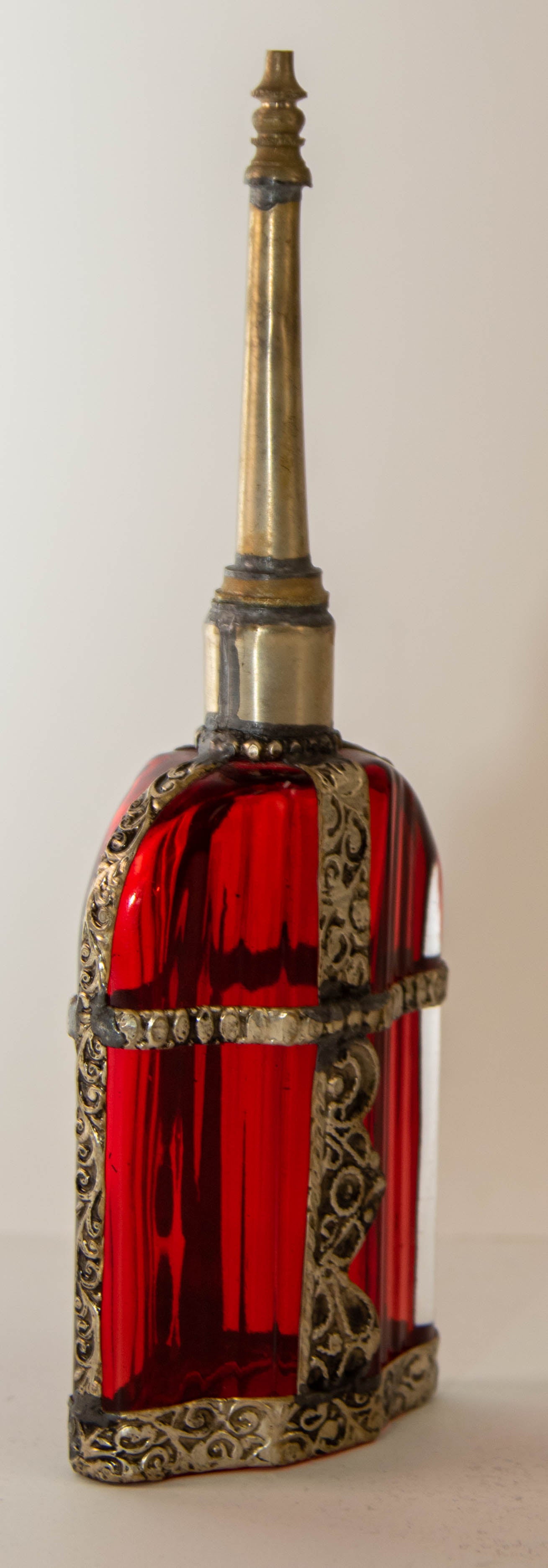 Moroccan Perfume Bottle Sprinkler with Embossed Metal Overlay and Red Glass