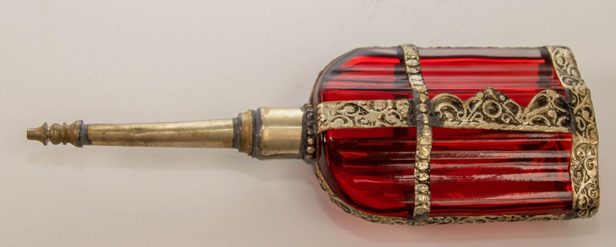 Moroccan Perfume Bottle Sprinkler with Embossed Metal Overlay and Red Glass