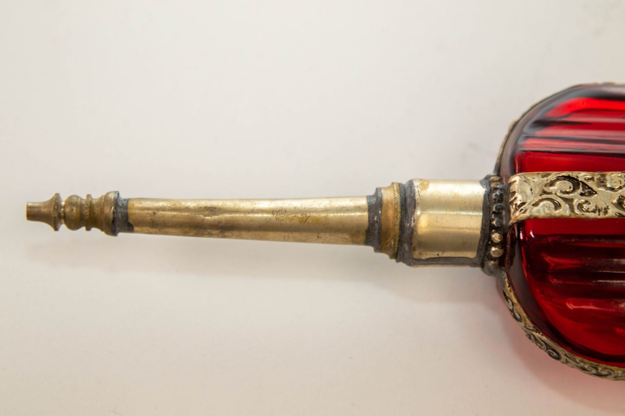 Moroccan Perfume Bottle Sprinkler with Embossed Metal Overlay and Red Glass