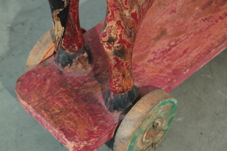 Pair of Monumental Indian Polychrome Carved Wood Horses on Wheels, 19th C.