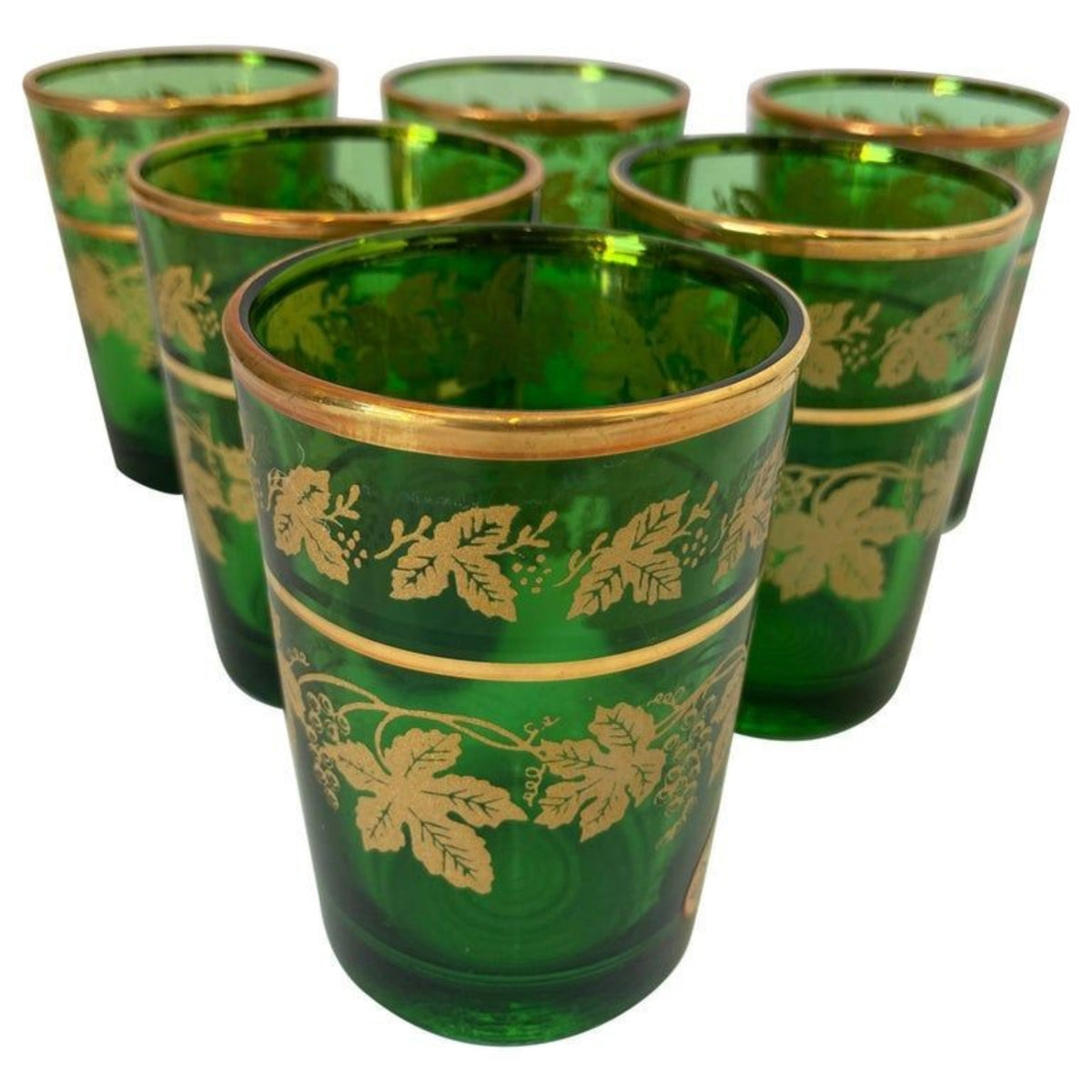 Set of six green hand blown glass shot glasses with gold Moorish pattern frieze.
