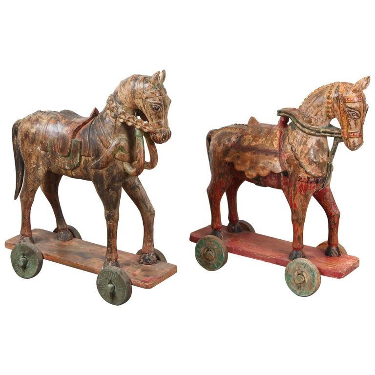 Pair of Monumental Indian Polychrome Carved Wood Horses on Wheels, 19th C.