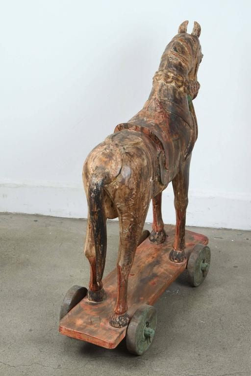 Pair of Monumental Indian Polychrome Carved Wood Horses on Wheels, 19th C.