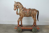 Pair of Monumental Indian Polychrome Carved Wood Horses on Wheels, 19th C.
