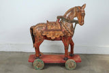 Pair of Monumental Indian Polychrome Carved Wood Horses on Wheels, 19th C.