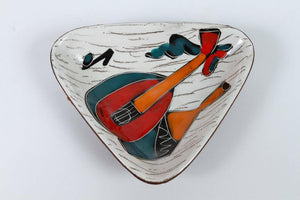 Four Italian Leather Backed Decorative Ceramic Dishes