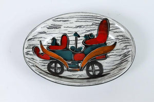 Four Italian Leather Backed Decorative Ceramic Dishes