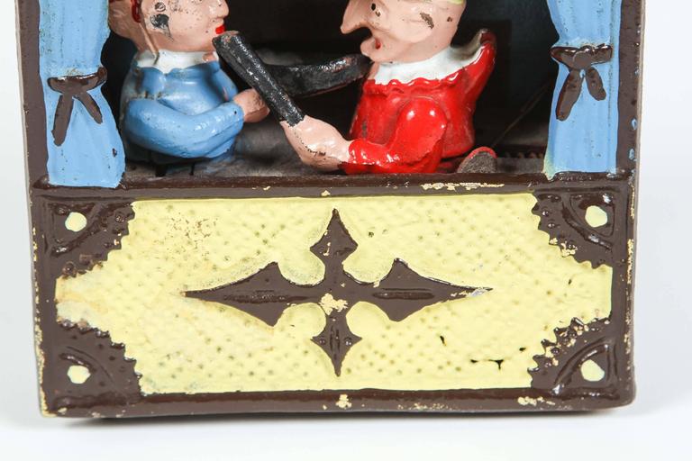 Vintage Cast Iron Book of Knowledge Mechanical Bank, Punch & Judy, 20th Century