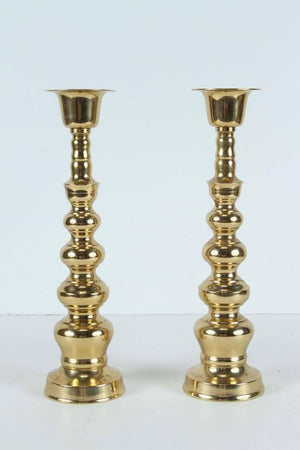 Pair of Polished Brass Asian Candlesticks