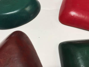 Four Italian Leather Backed Decorative Ceramic Dishes