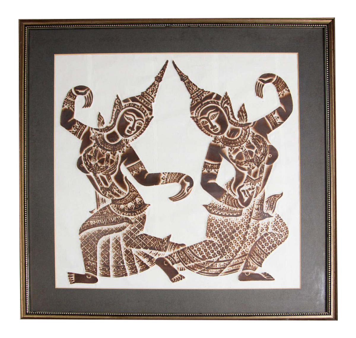 A vintage charcoal rubbing of two Thai dancers from the Wat Pho temple, framed in a gray frame.