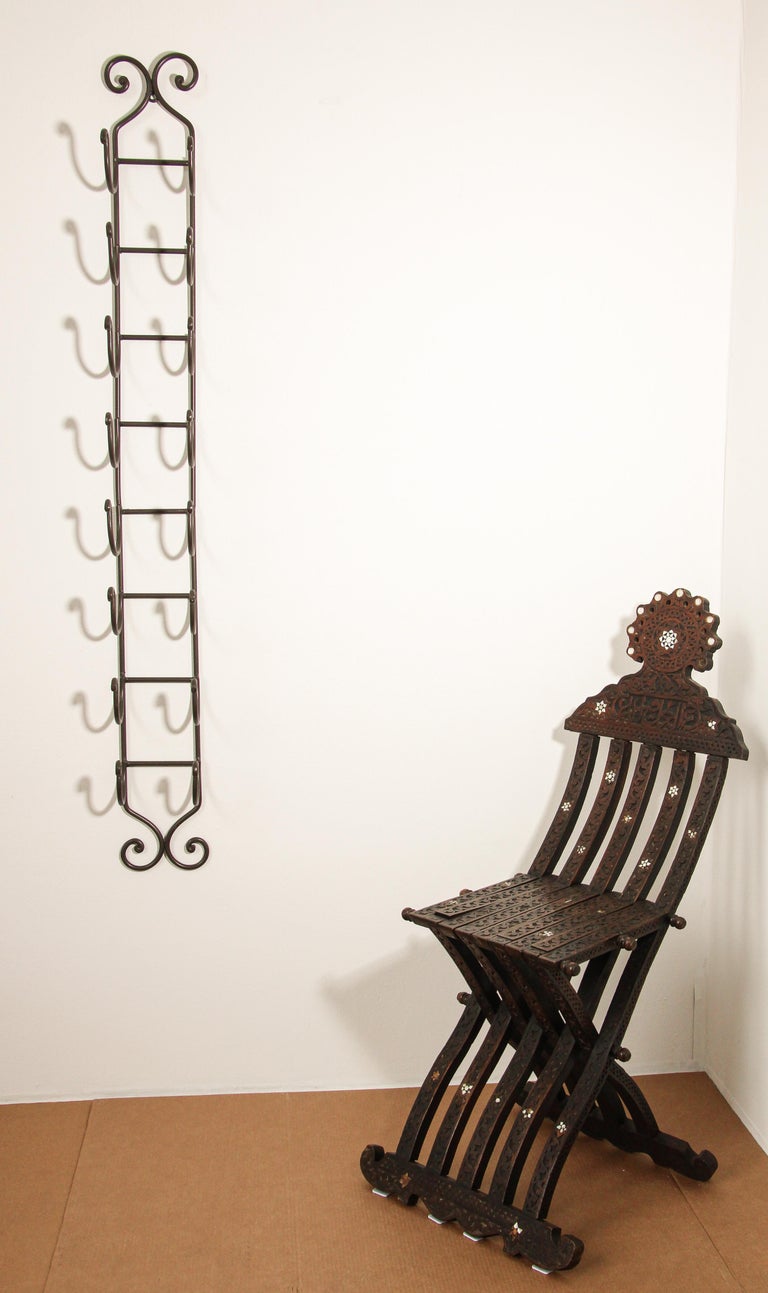 Wall mounted deals iron rack